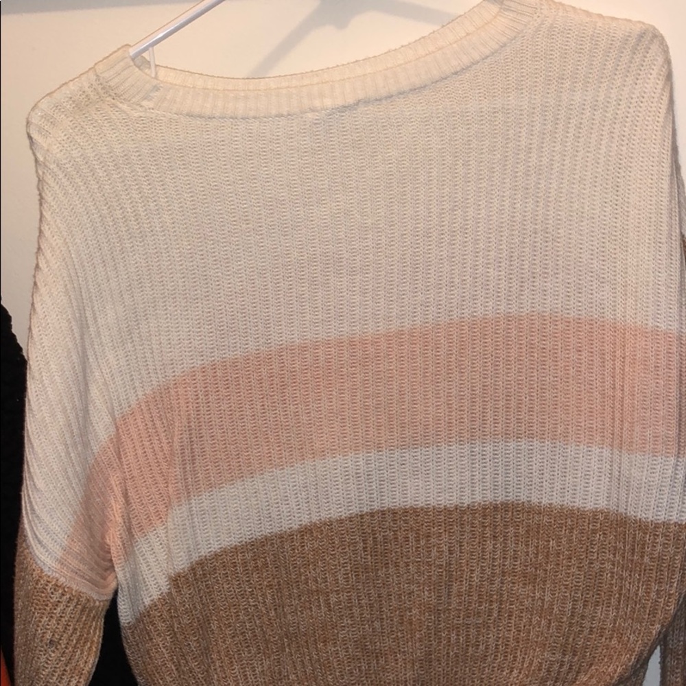 pink, white and tan sweater